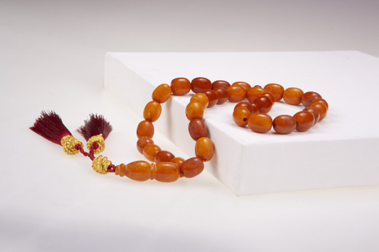 Amber jewellery in warm orange and cognac shades